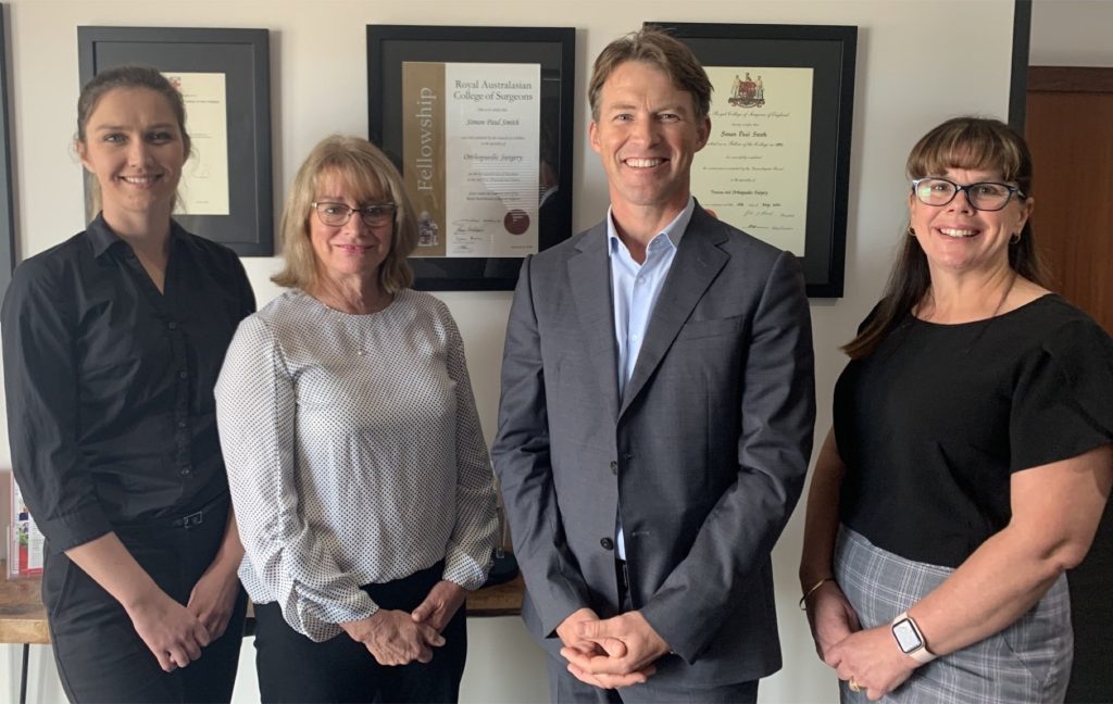 Dr Simon Smith with his practice team